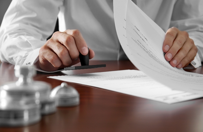 lawyer put a stamp on the document