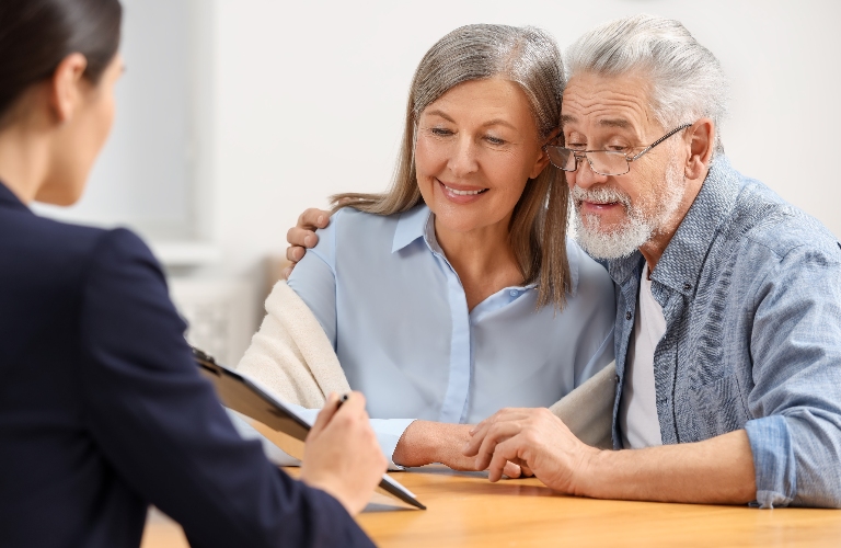 lawyer is consulting senior couple