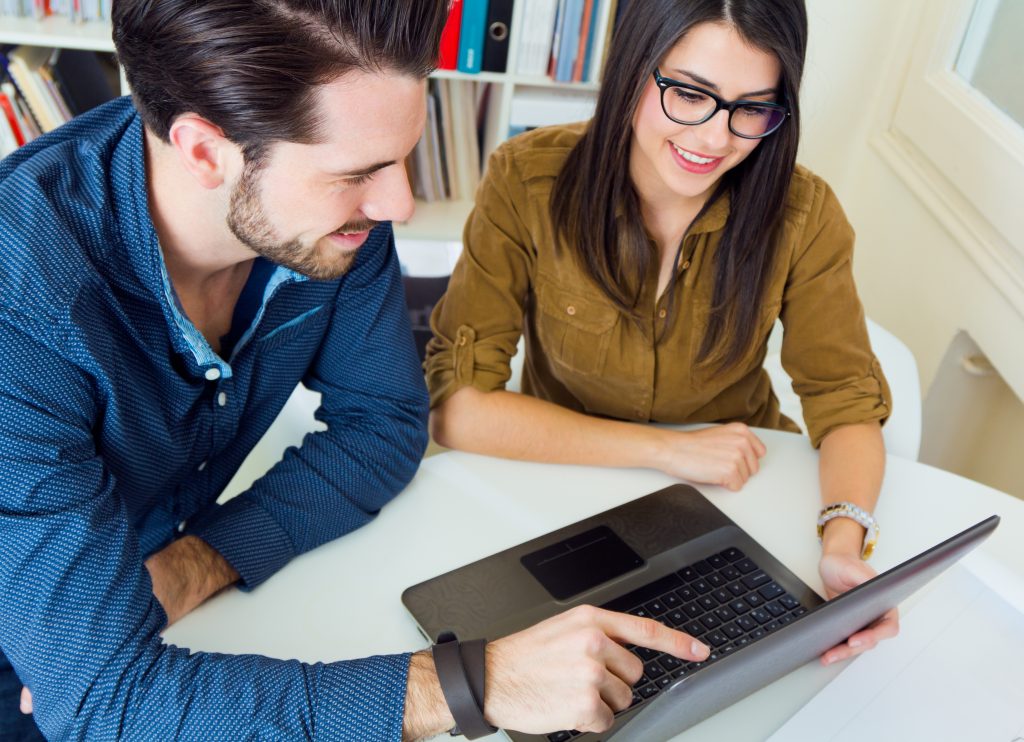 Young Professionals Collaborating in Office